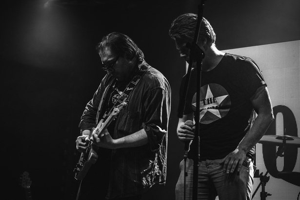 Monite playing live, black and white