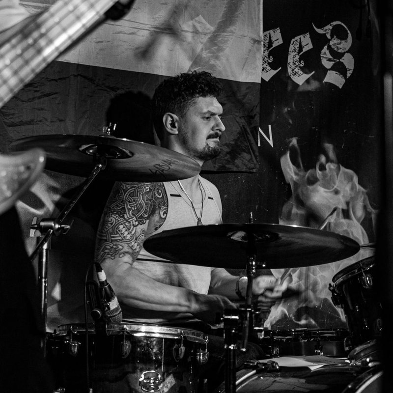 Will Hendy behind the kit, black and white